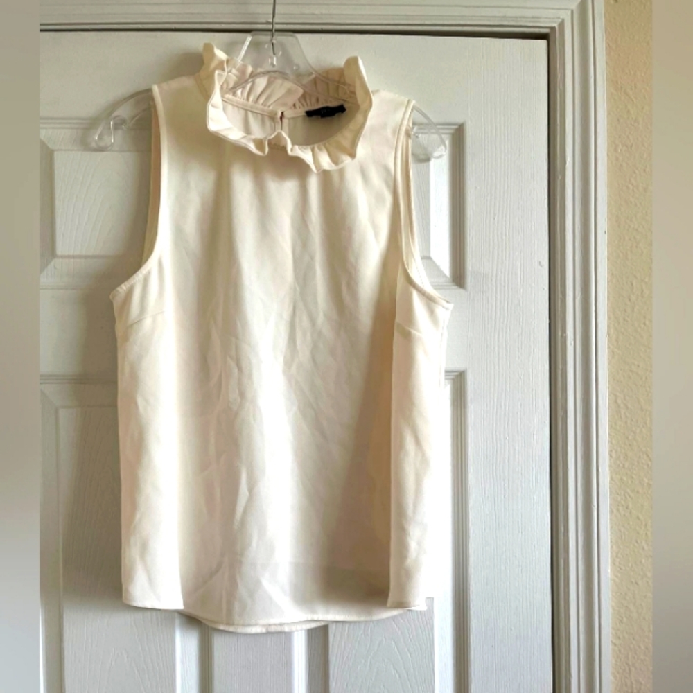Ruffled high neckline sleeveless top| Size: Large